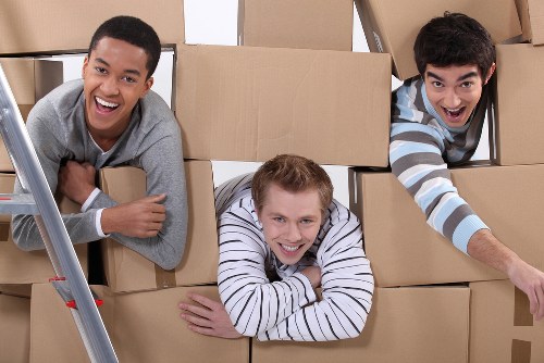 Local Haringey moving team loading boxes and furniture