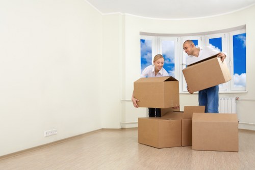 Professional movers handling furniture for a local move in Haringey