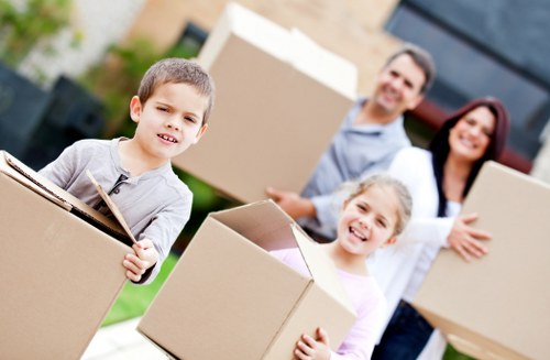Commercial removals team transporting office equipment in Haringey