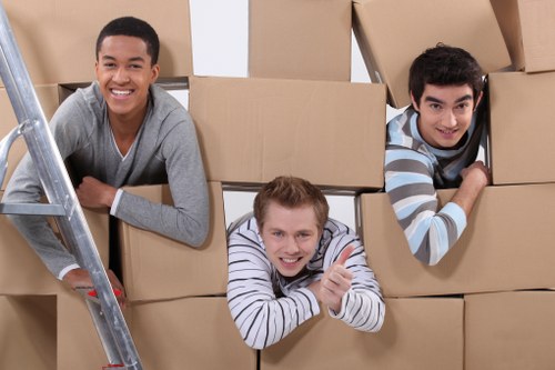 Local removal team managing furniture loading in North London