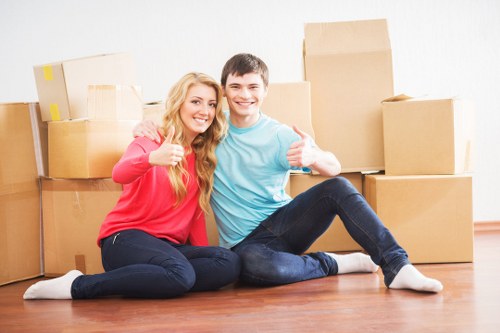 Business relocation process with packed boxes and labelled office items