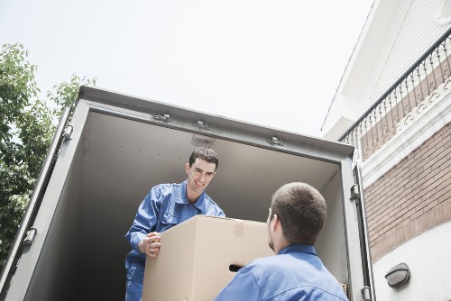 Careful unloading of boxes and furniture at a new Haringey property