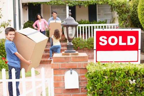 Risk-aware moving team working in a residential property