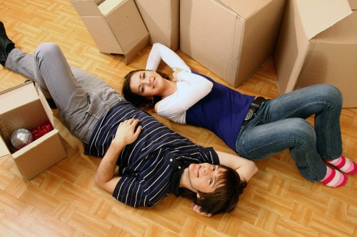 Local office removals team handling desks and office furniture carefully